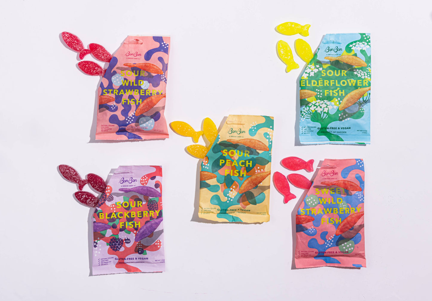 Set of five colorful opened packages of Sour Fish candies by BonBon, in various flavors.