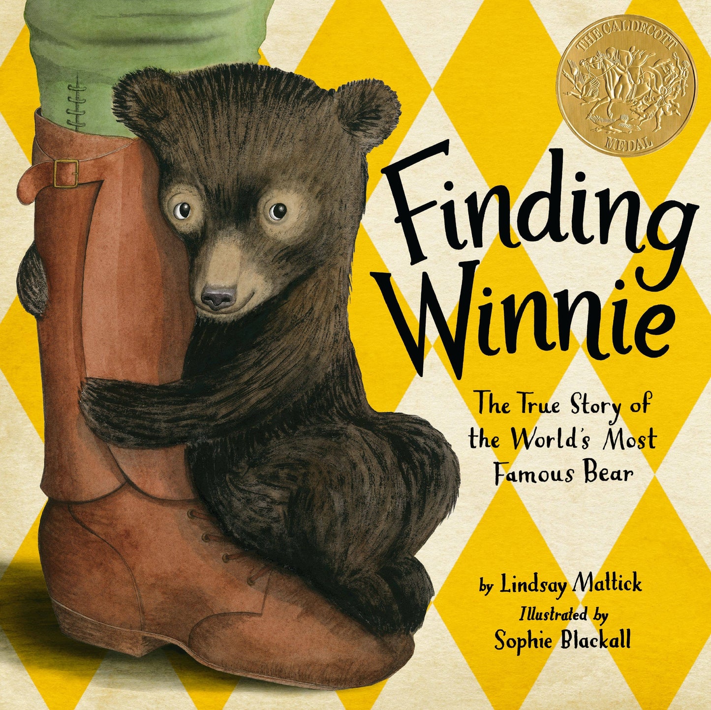 FInding Winnie book cover showing Caldecott Medal and illustration of black bear hugging a person's boot