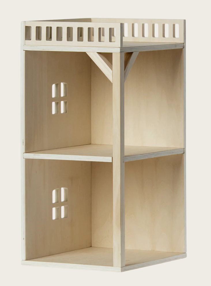 Wooden dollhouse on a white background