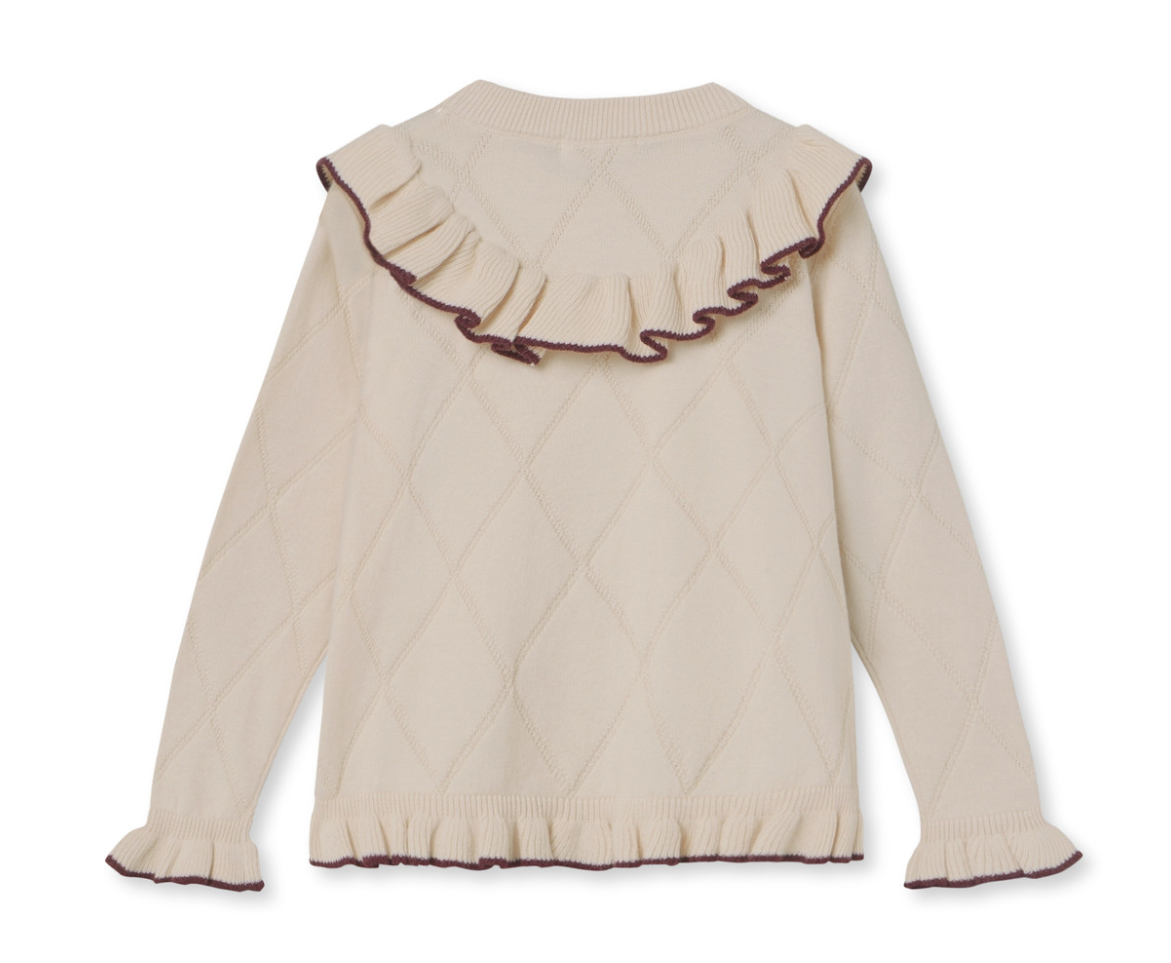 Back of children's cardigan sweater with a ruffle collar and sleeves edged in brown