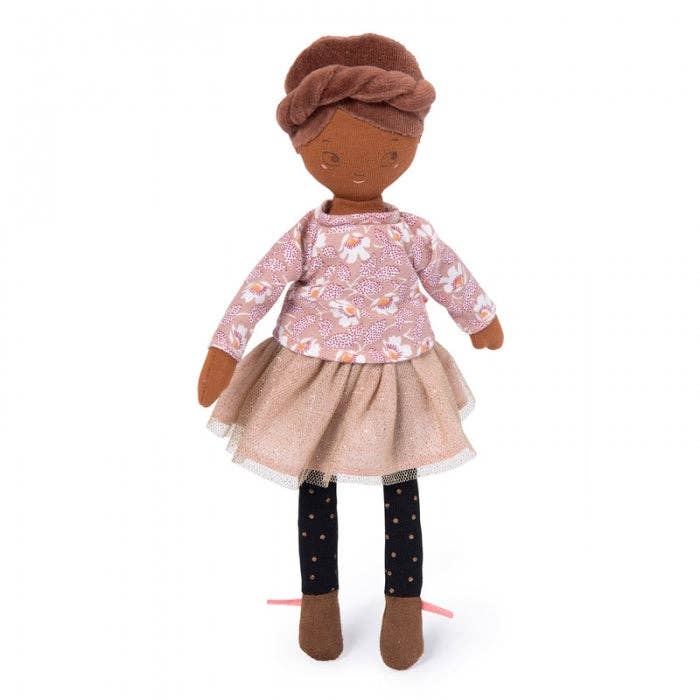 A plush doll with a floral patterned blouse, a tulle skirt, dotted tights, and a braided hairstyle. The doll is multicolored and appears to be a part of the 'Parisiennes' collection.