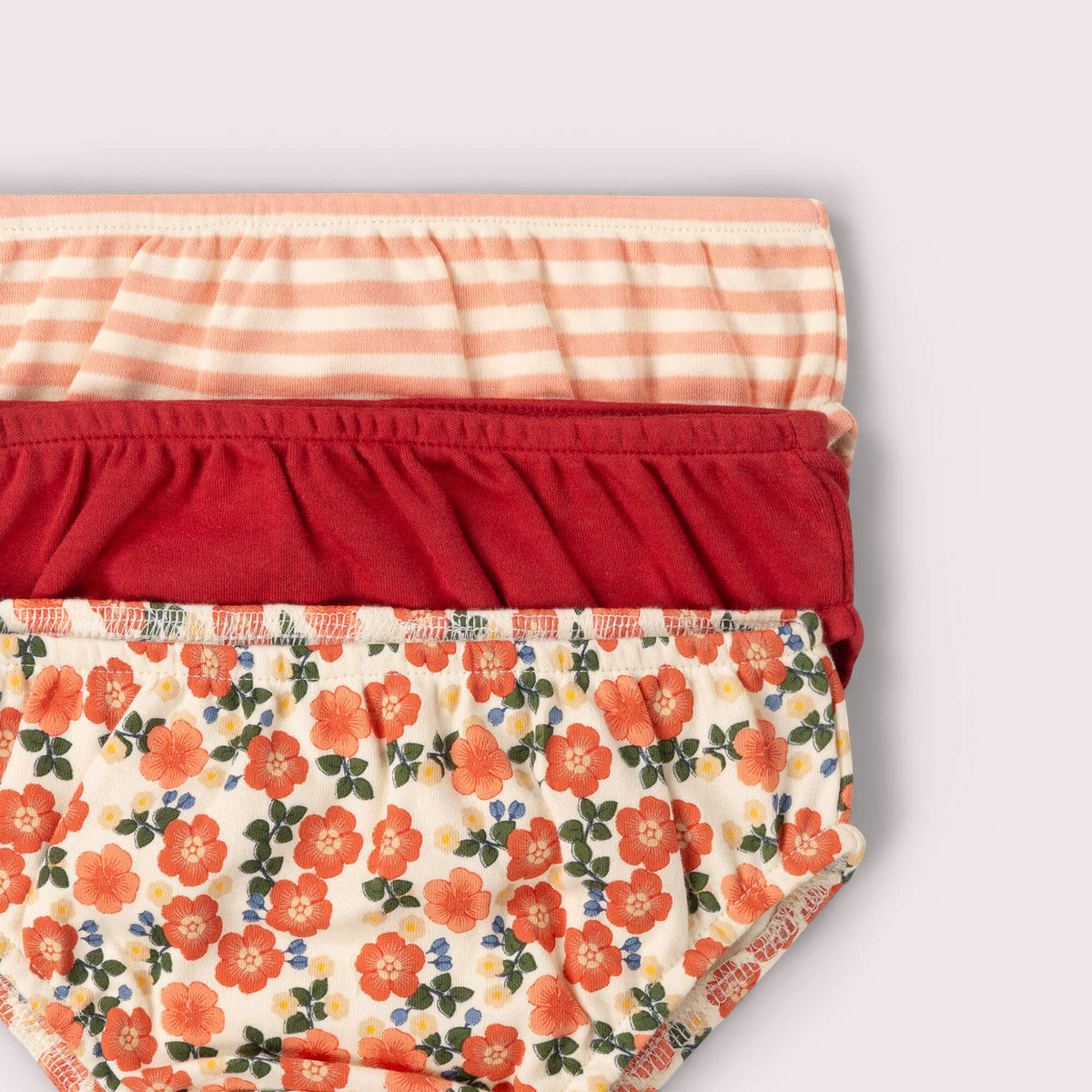Detail of elastic waistbands on the Petals children's underwear three-pack.