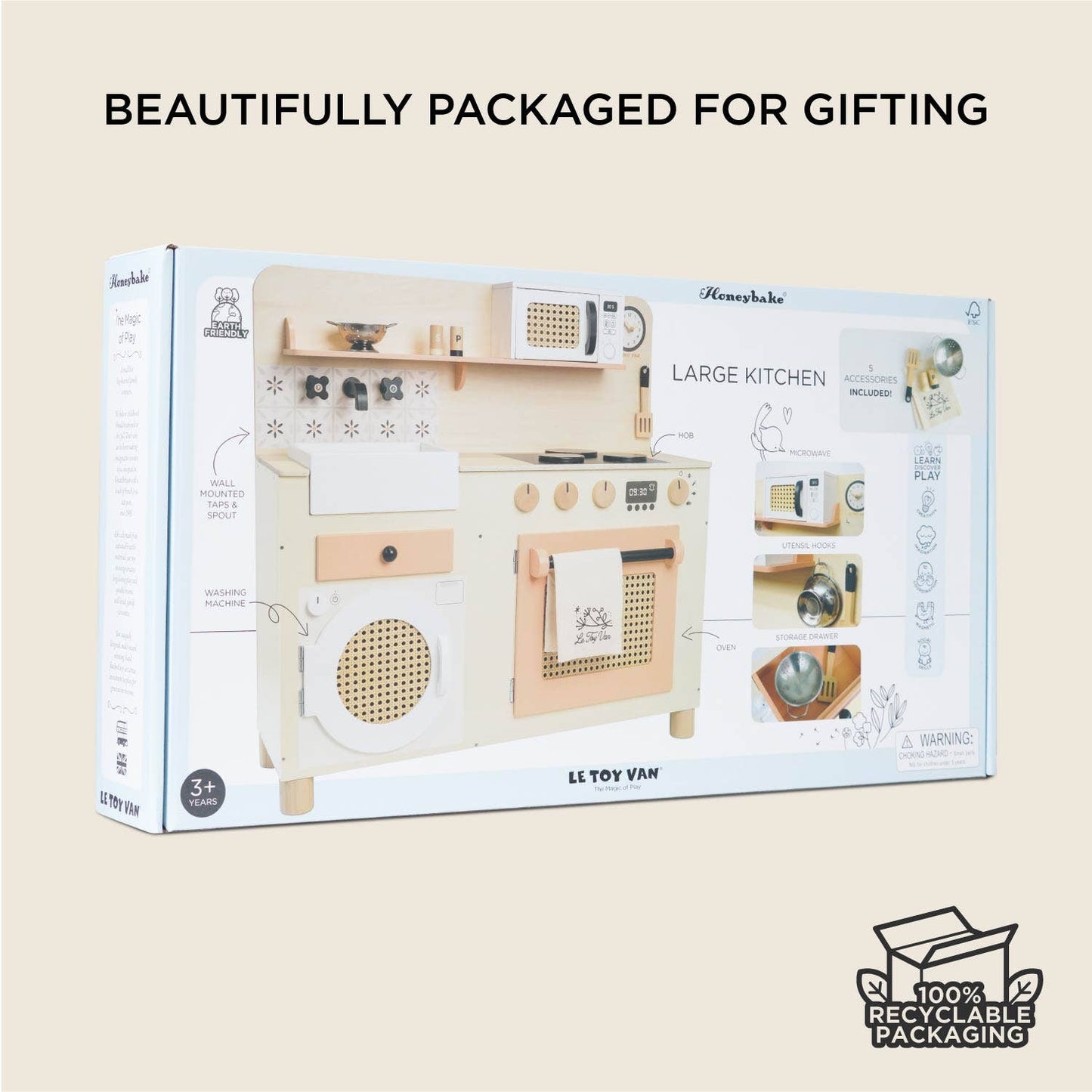 Toy kitchen set packaging with recyclable packaging label on a beige background