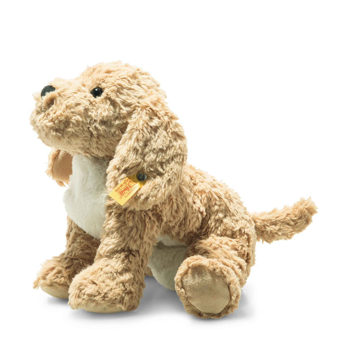 Tan goldendoodle stuffed animal on a white background