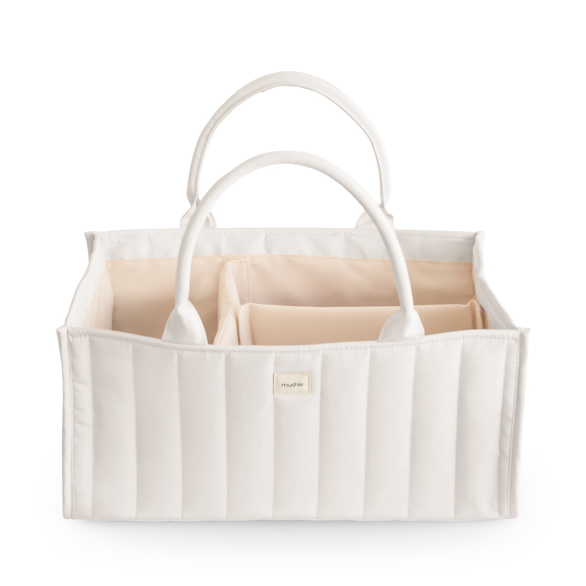 White fabric caddy with handles on a white background