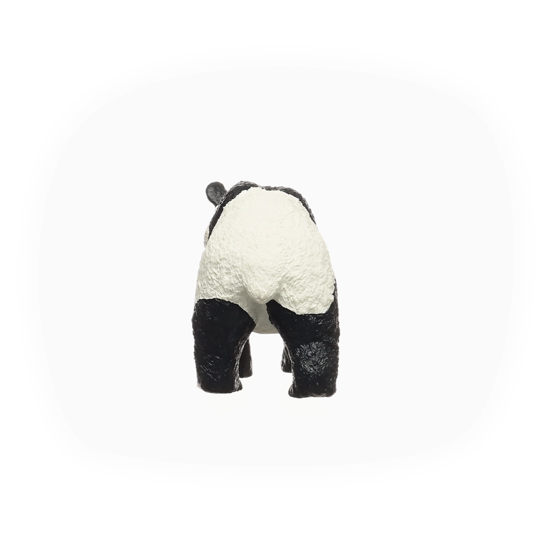 Panda figurine on a white background