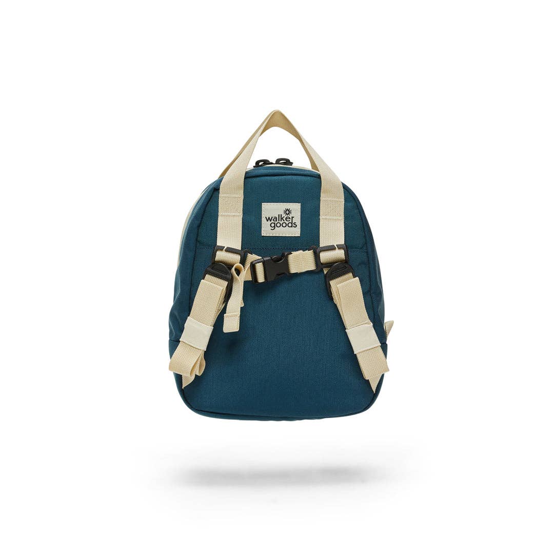 Navy walker goods kids backpack with white straps and a walker good logo label