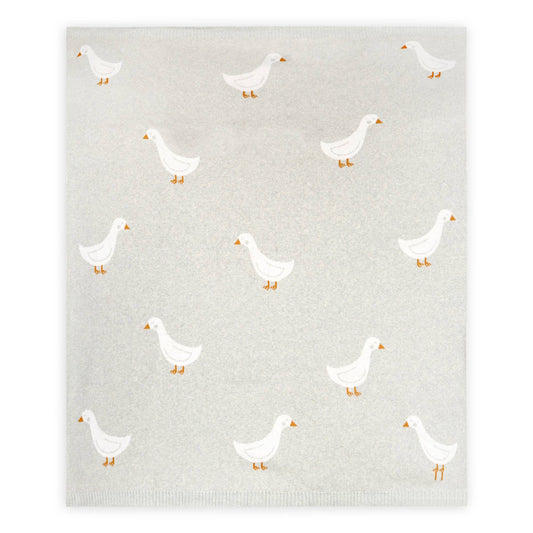 Pattern of white ducks on a textured gray background