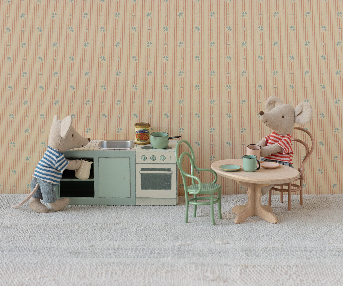 Maileg mice in kitchen with counter top, pot along with mouse at table can chair setting