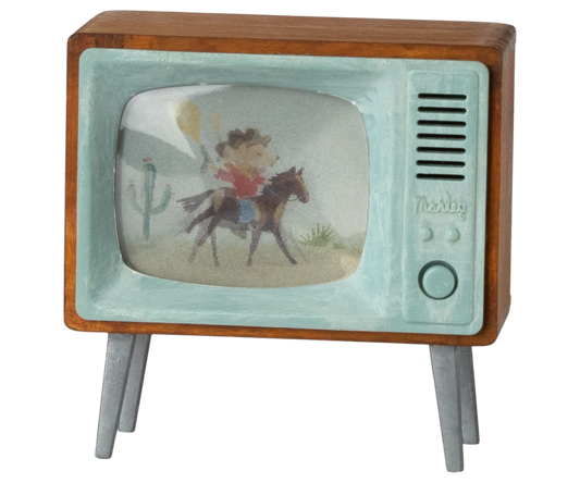 Vintage-style toy Maileg dollhouse television with a cowboy on a horse screen