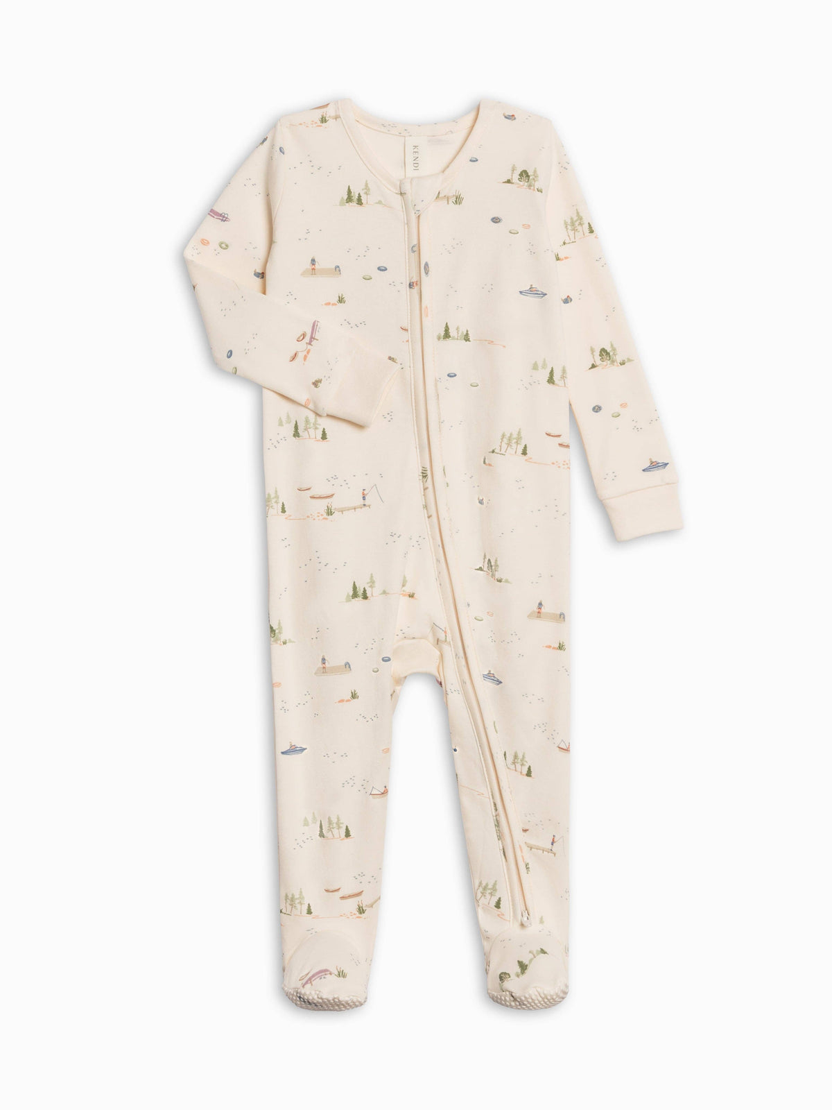 A baby long-sleeve footed sleeper in cream with a small multicolor nature print, featuring a front zipper and zippered crotch.