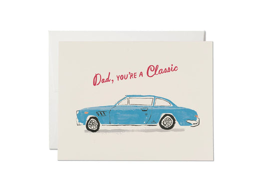Greeting card with a blue car illustration and text 'Dad, you're a classic' on a white background
