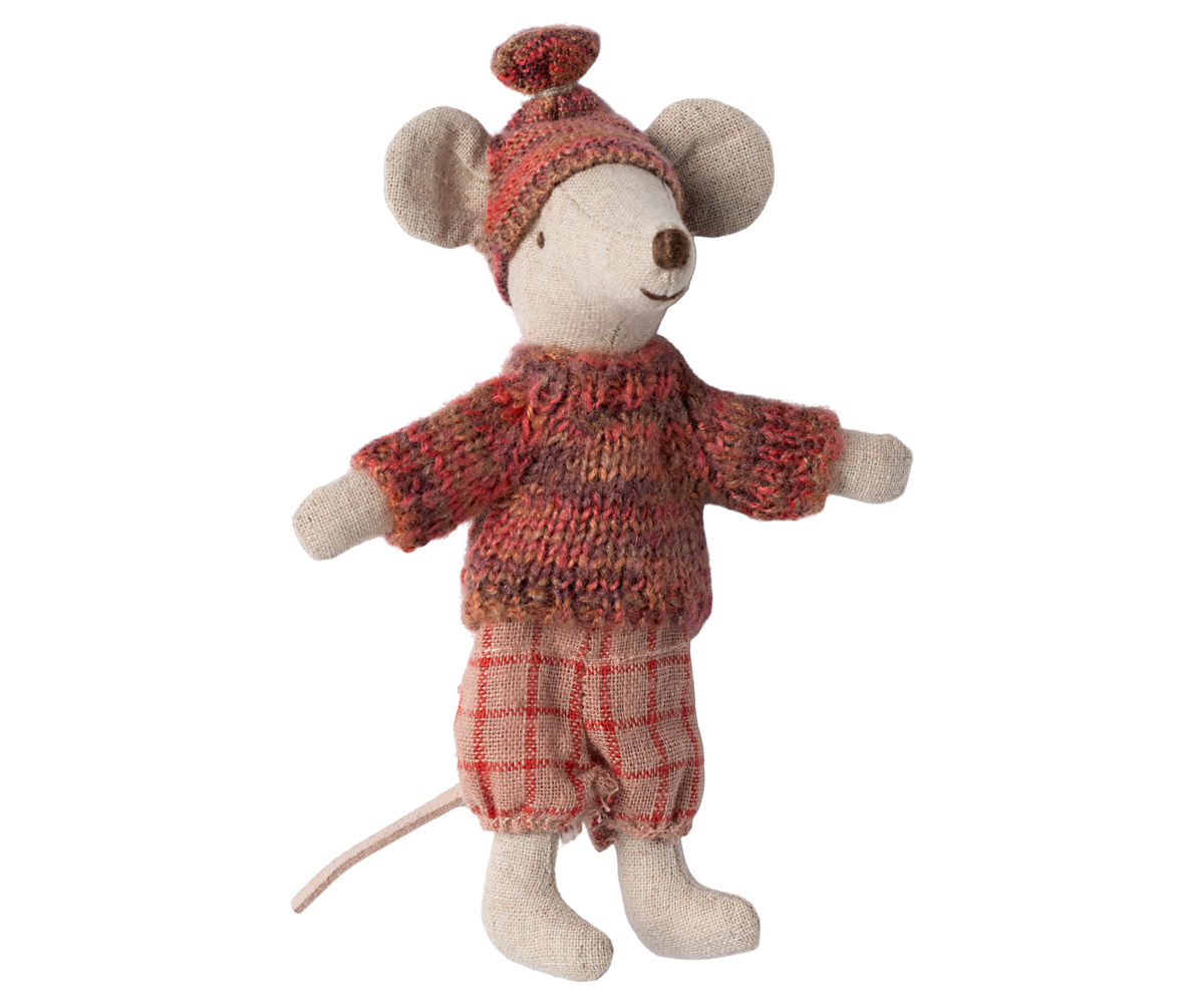 Stuffed toy mouse in a knitted outfit on a white background