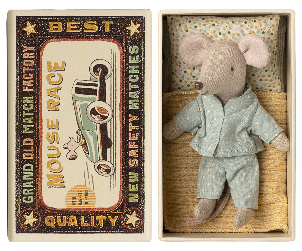 Stuffed mouse toy in a matchbox with a vintage-style label
