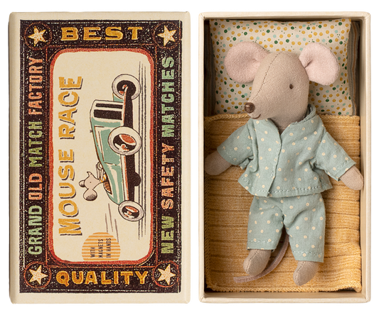 Stuffed mouse toy in a matchbox with a vintage-style label