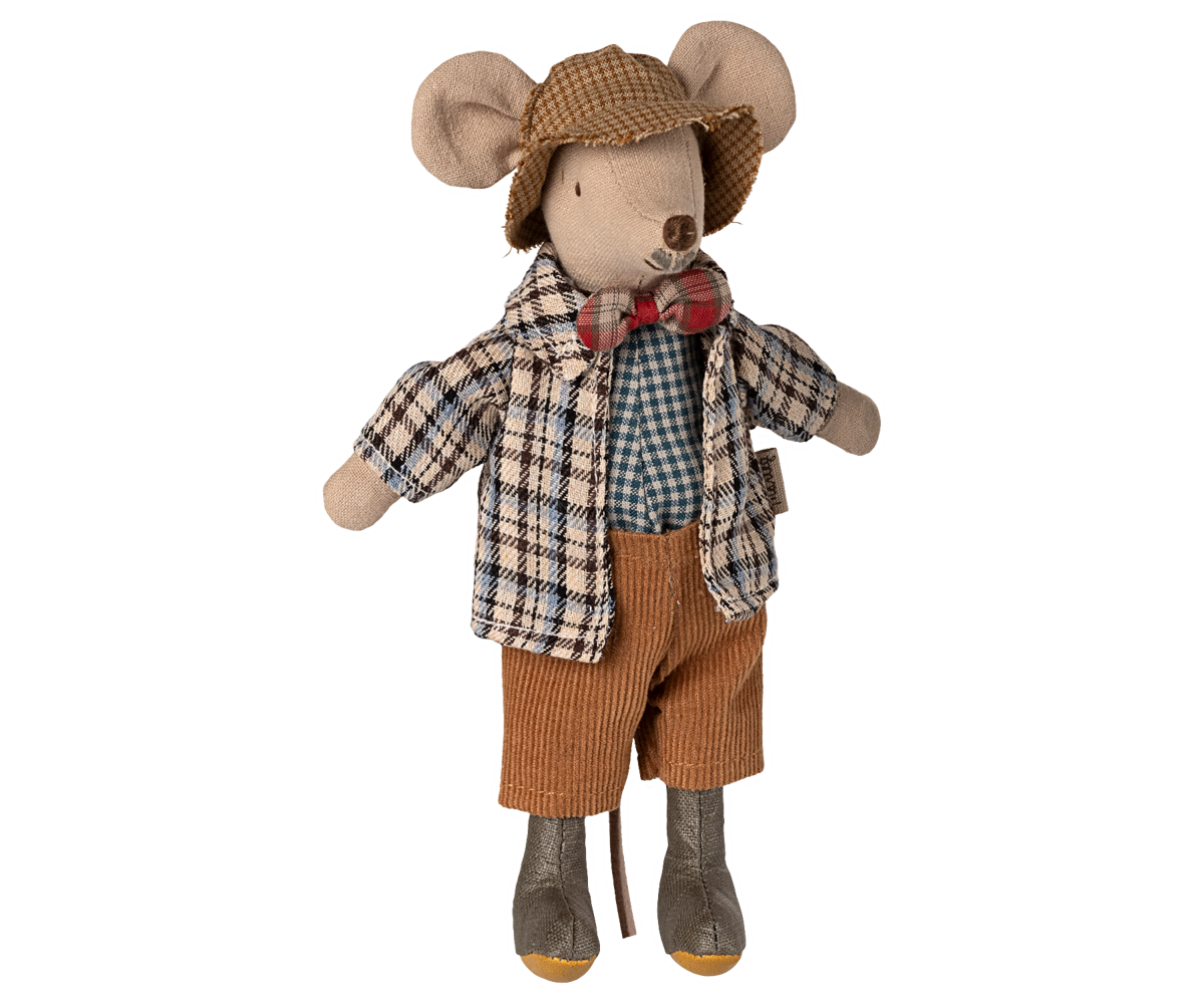 Stuffed mouse toy dressed in a checkered shirt, brown shorts, and a hat on a white background