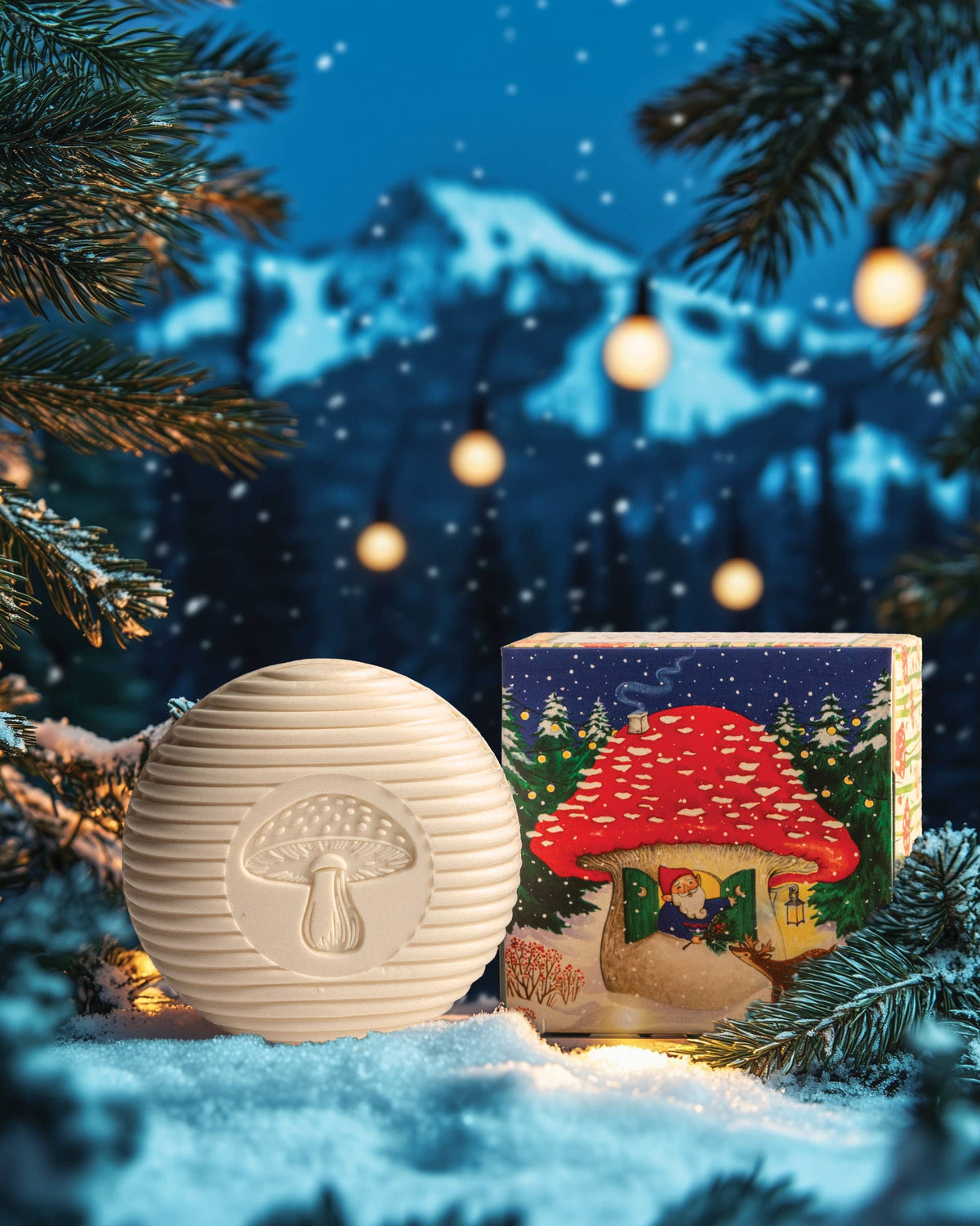 Swedish Pine gnome soap and gift box in a snowy evergreen scene with string lights