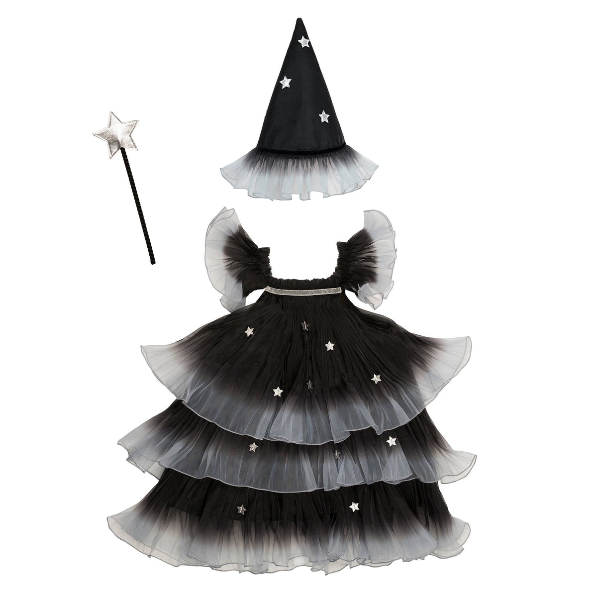 A children's witch costume set on a plain white background, including a black-and-white tiered tulle dress with star accents, a pointed witch hat, and a matching wand.