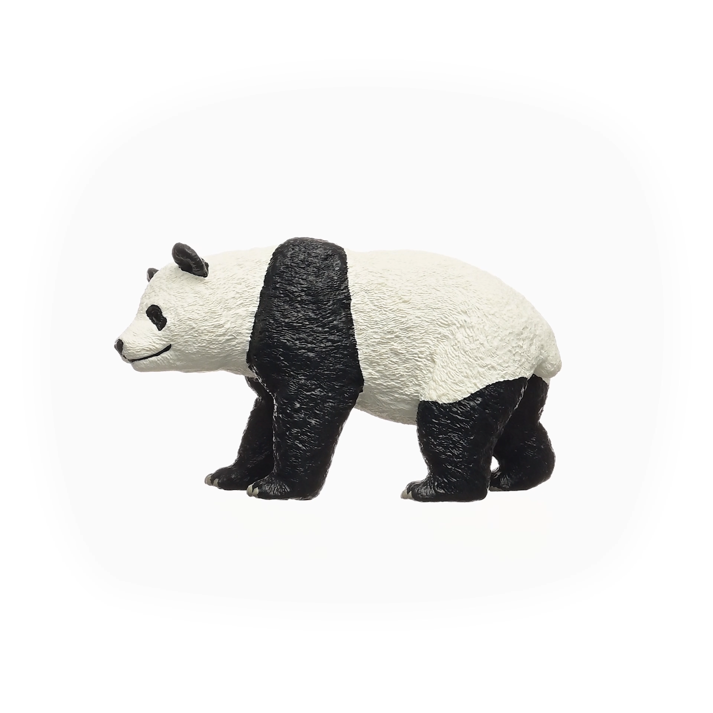 Panda figurine on a white background