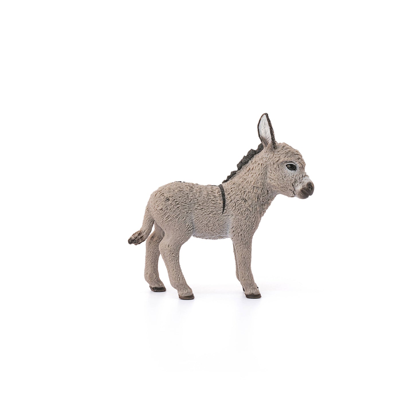 Donkey figurine on a white background