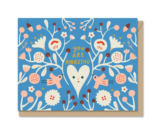 Greeting card with floral design and 'You Are Amazing' text on a blue background