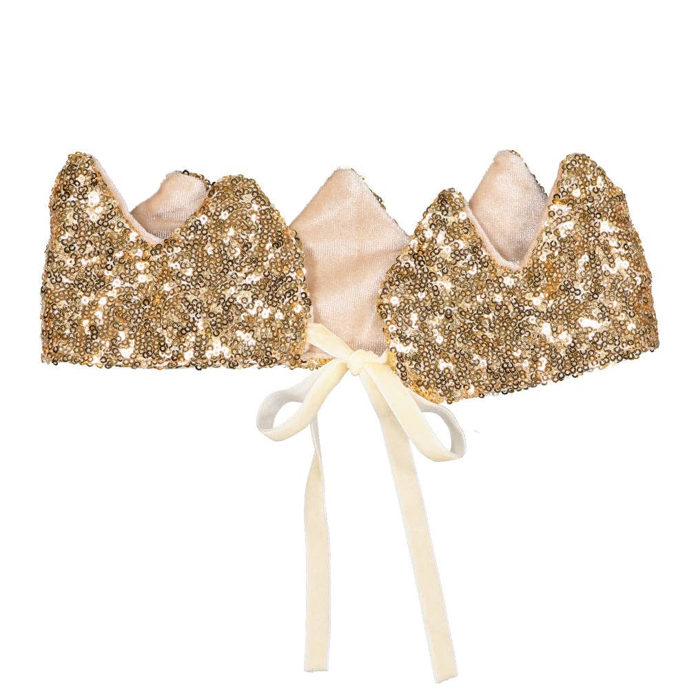 Gold sequin bralette with a beige bow on a white background