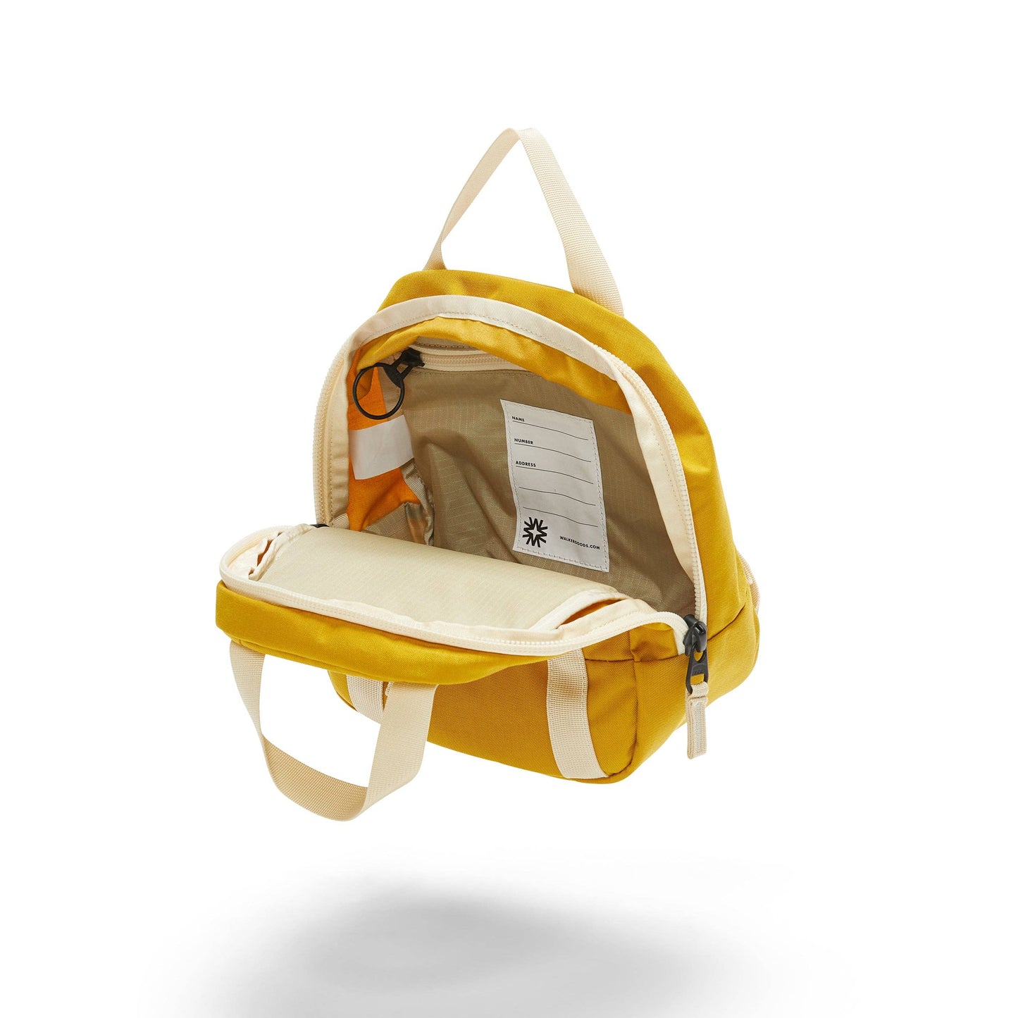 Inside view of the yellow walker family goods kids backpack, on a white background