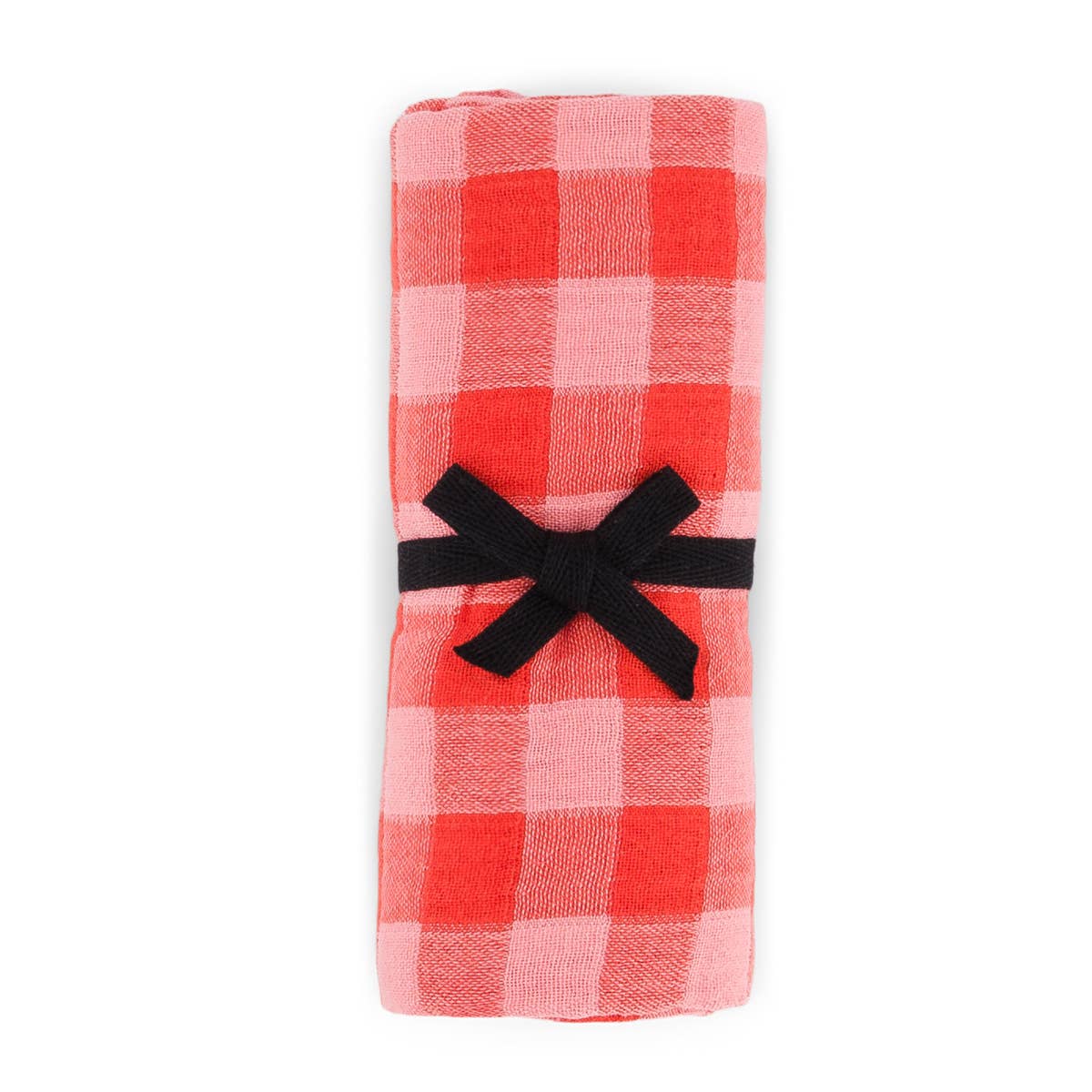 Red and pink checkered fabric with a black bow on a white background