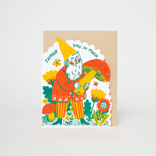letterpress greeting card which reads "thank you so much" featuring a gnome holding a mushroom among flowers