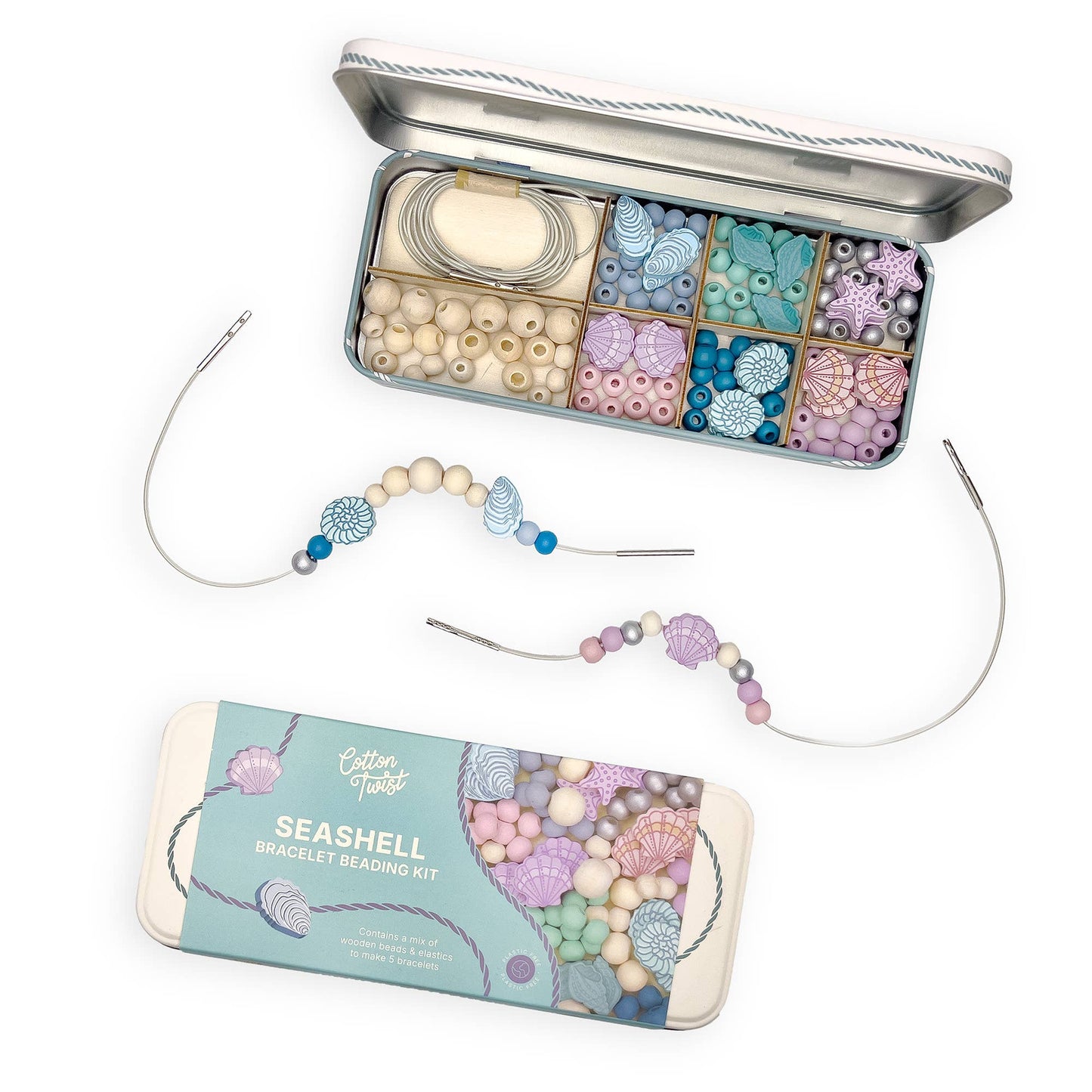 Seashell bracelet beading kit with beads and tools on a white background