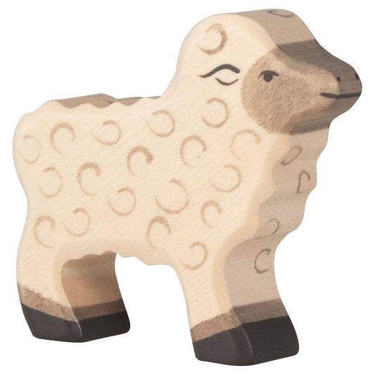Wooden sheep figure with a plain background