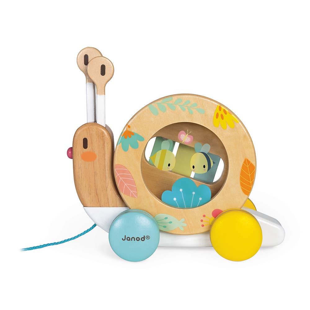 Wooden snail-shaped pull toy with wheels and colorful design, featuring the brand 'Janod'.