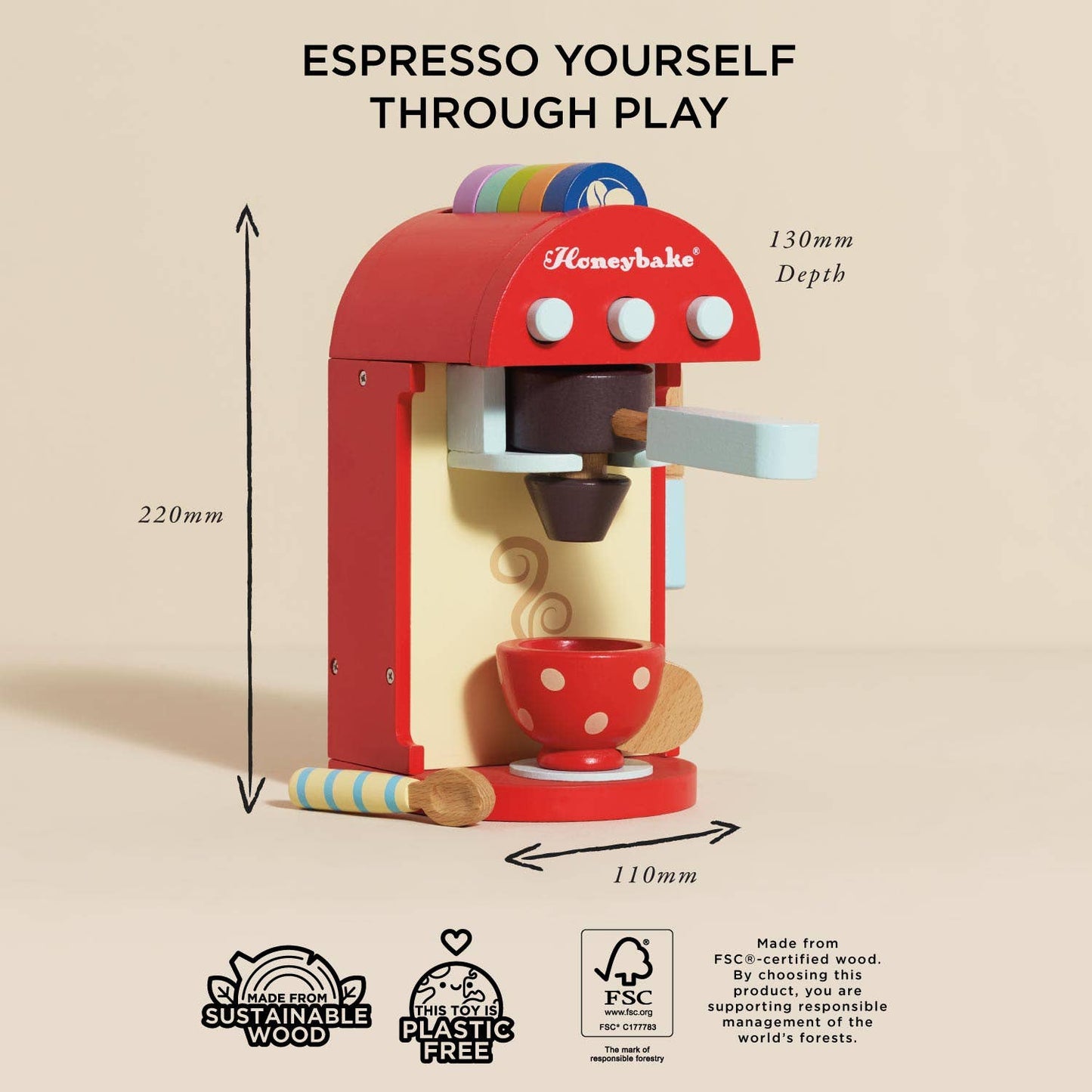 Red toy espresso machine with dimensions and branding on a beige background