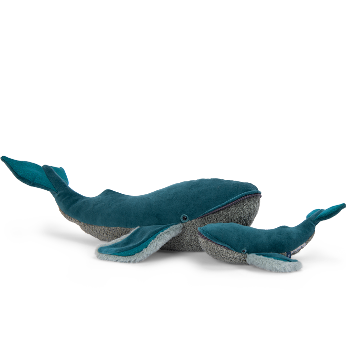 Blue whale-shaped plush toy on a white background