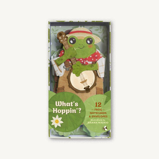 Pack of frog-themed notecards and envelopes with a green frog character holding a banjo on a white background.