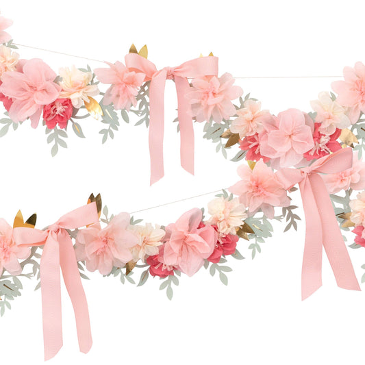 Floral garland with pink flowers and ribbons on a white background