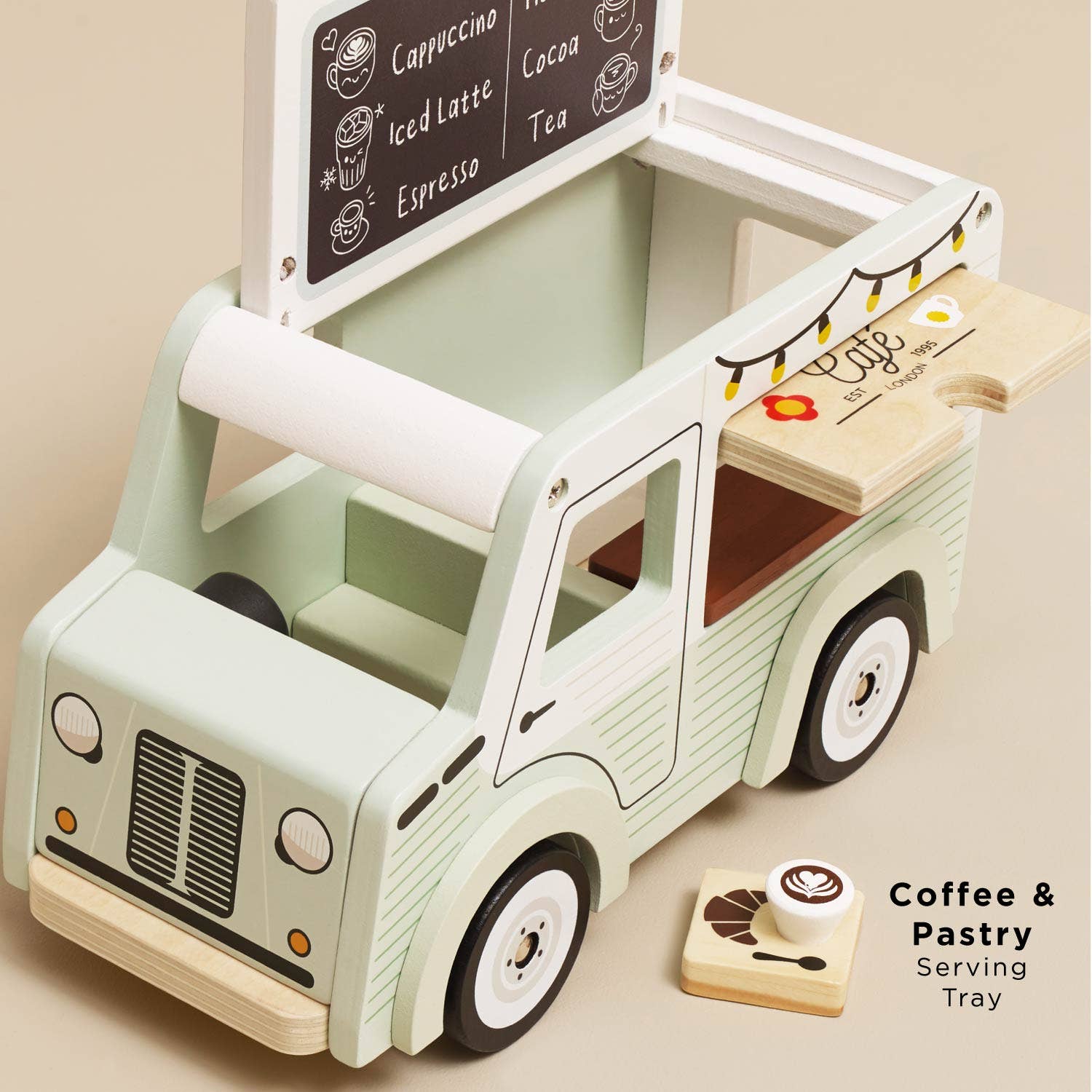 Wooden toy coffee truck with a serving tray on a beige background