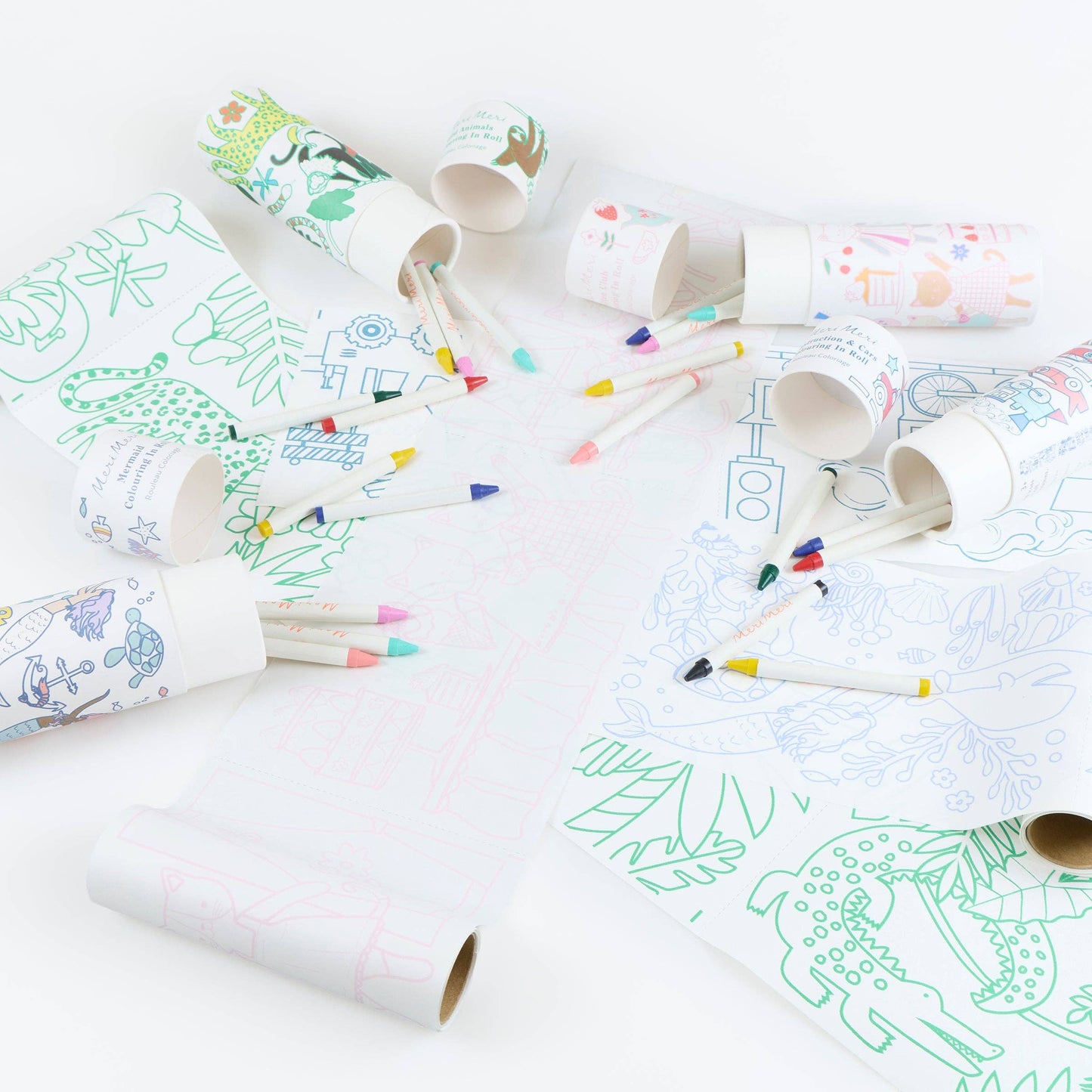 Coloring activity with paper tube and crayons on a white surface
