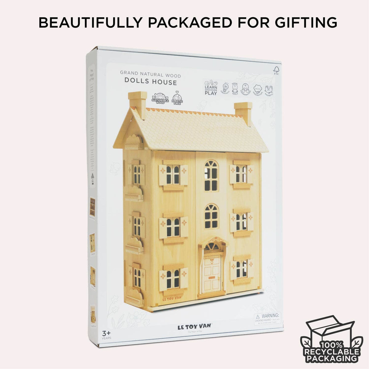 Wooden dolls' house packaging with 'Le Toy Van' branding on a white background.
