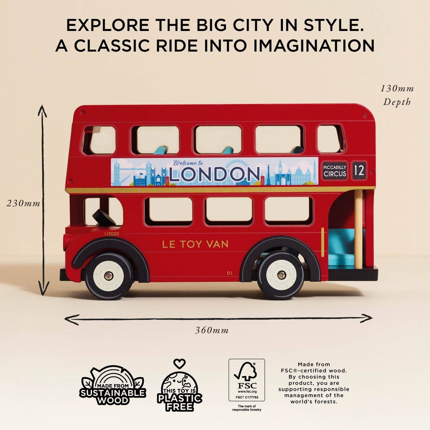 Red toy double-decker bus with 'Le Toy Van' branding, dimensions, and sustainability certifications on a beige background.