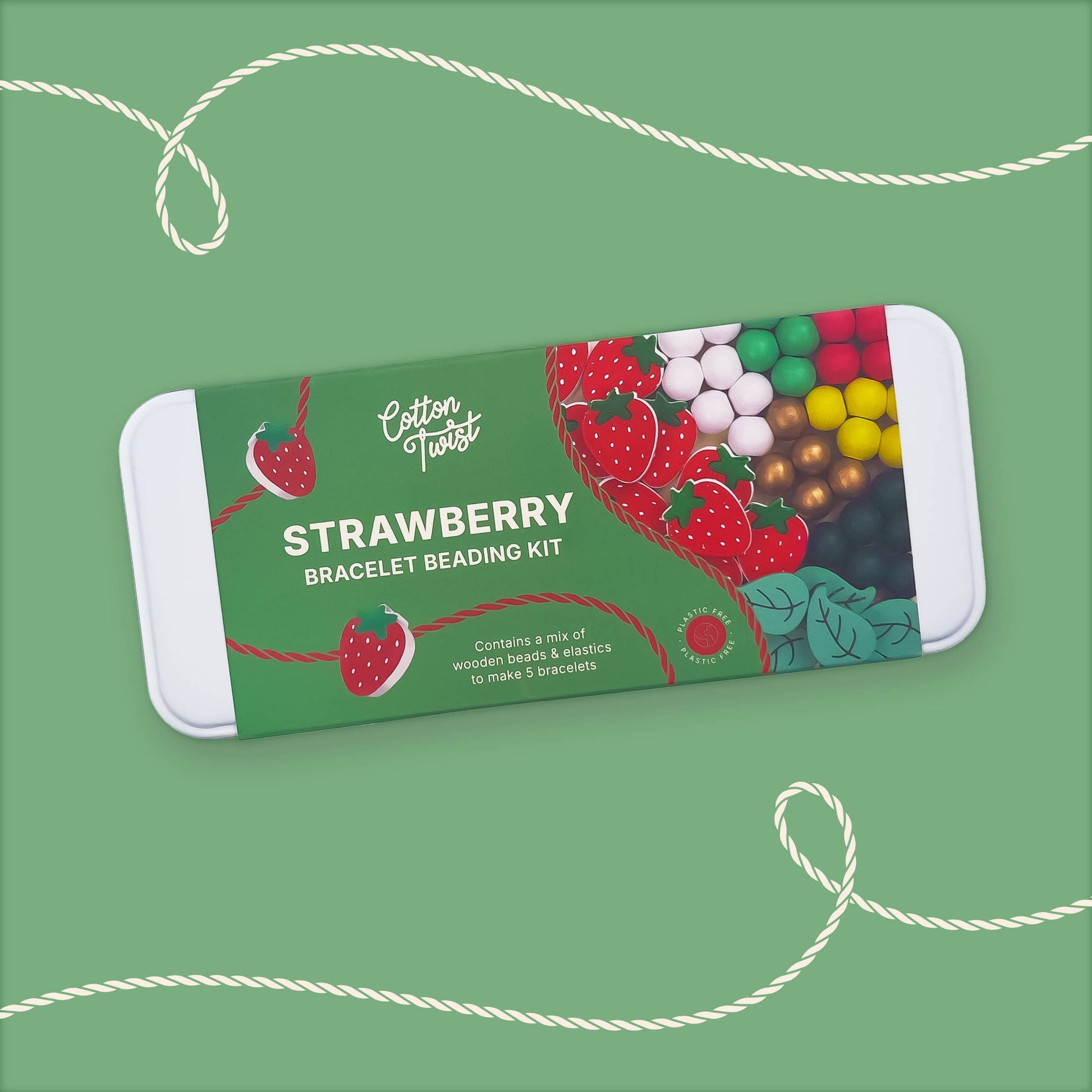 Strawberry bracelet beading kit packaging on a green background