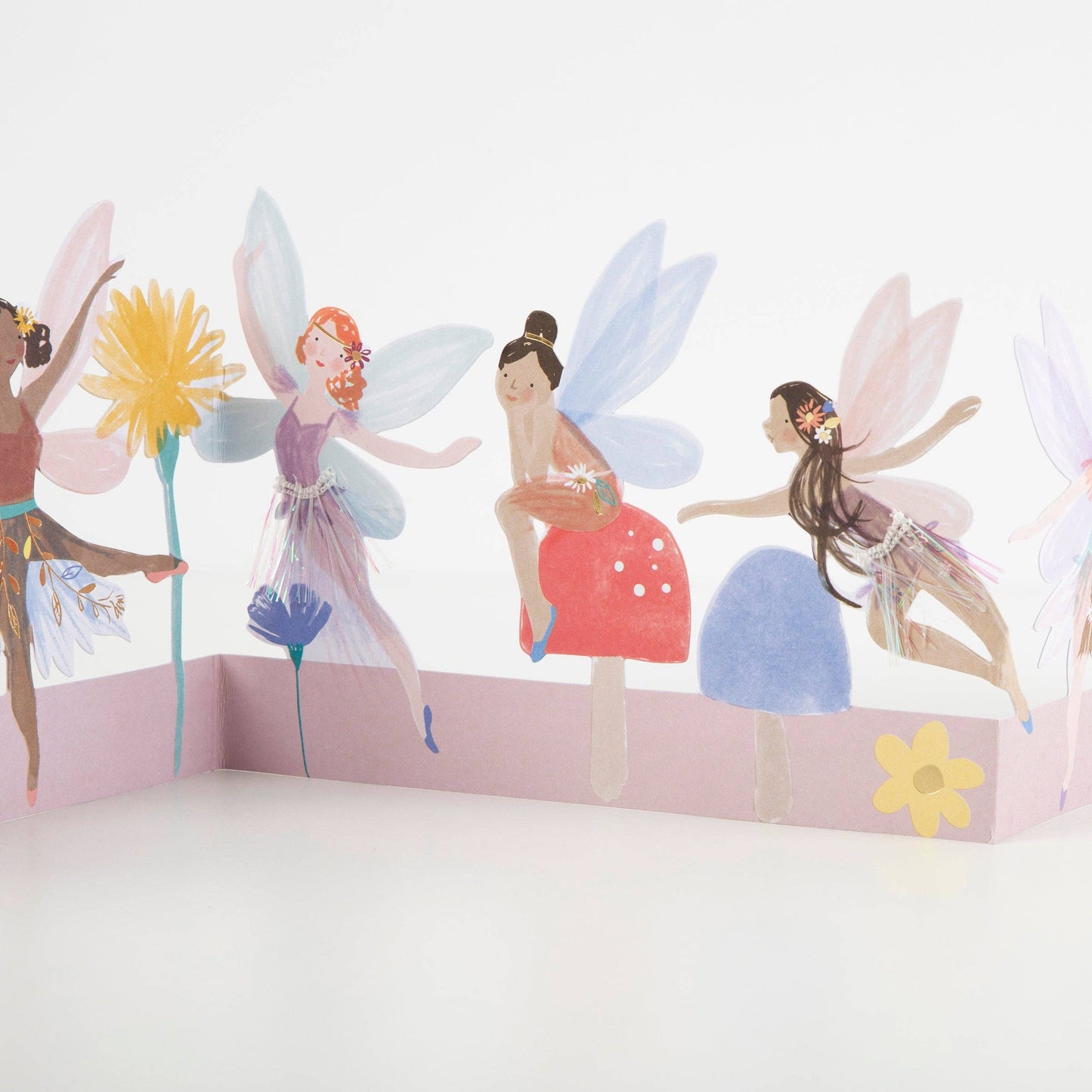 Wall decal with fairy designs on a white wall