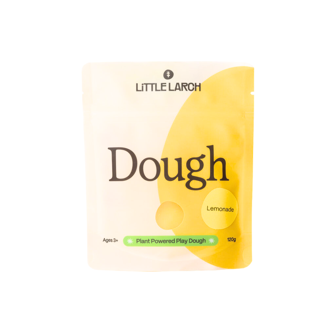 Package of natural play dough from the brand Little Larch, with color indicated by small color swatches on the packaging.