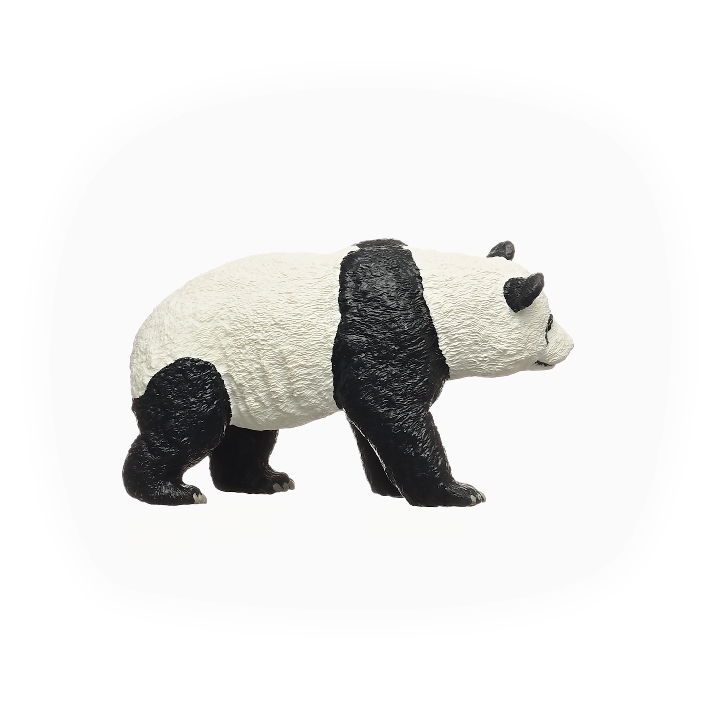 Panda figurine on a white background
