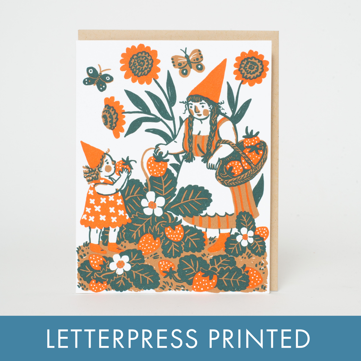 An everyday greeting card featuring a sweet illustration of a gnome and kiddo picking strawberries. Letterpress printed and packaged with a kraft paper envelope. 