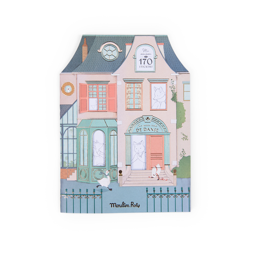 Coloring book with a house design on the cover, featuring windows and a door.