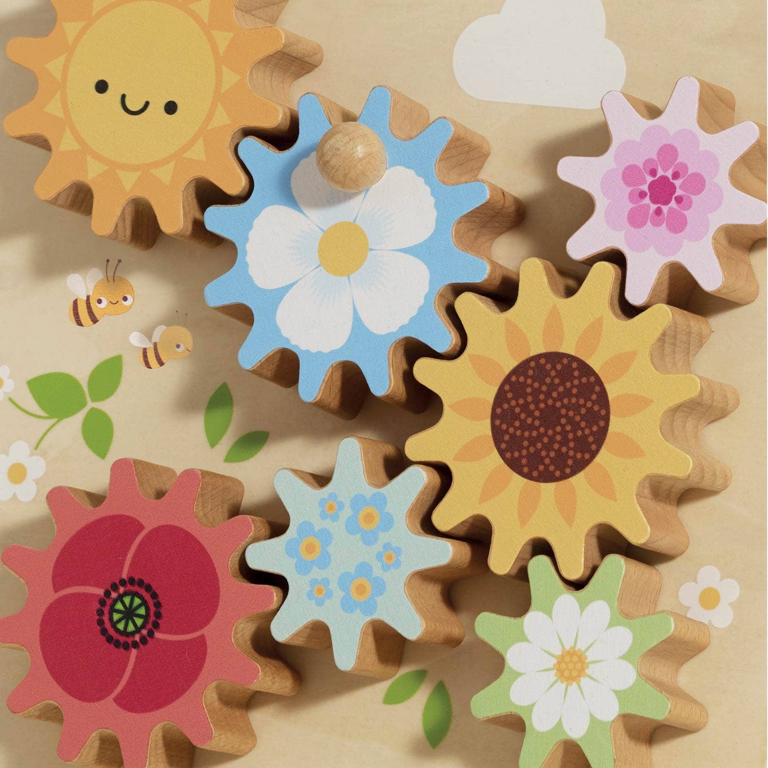 Wooden toy blocks shaped like flowers and a sun on a beige background