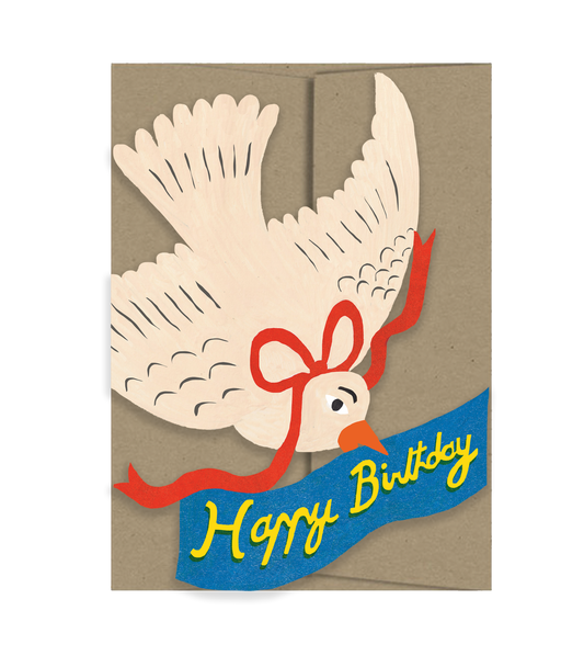Greeting card with a cutout bird holding a 'Happy Birthday' blue banner on a brown envelope