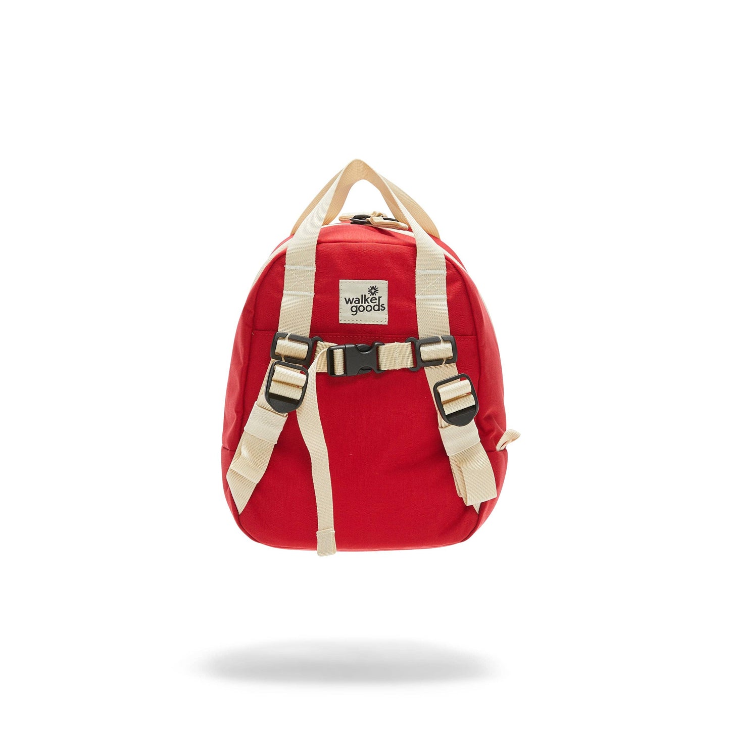 back of red kids backpack with ivory straps