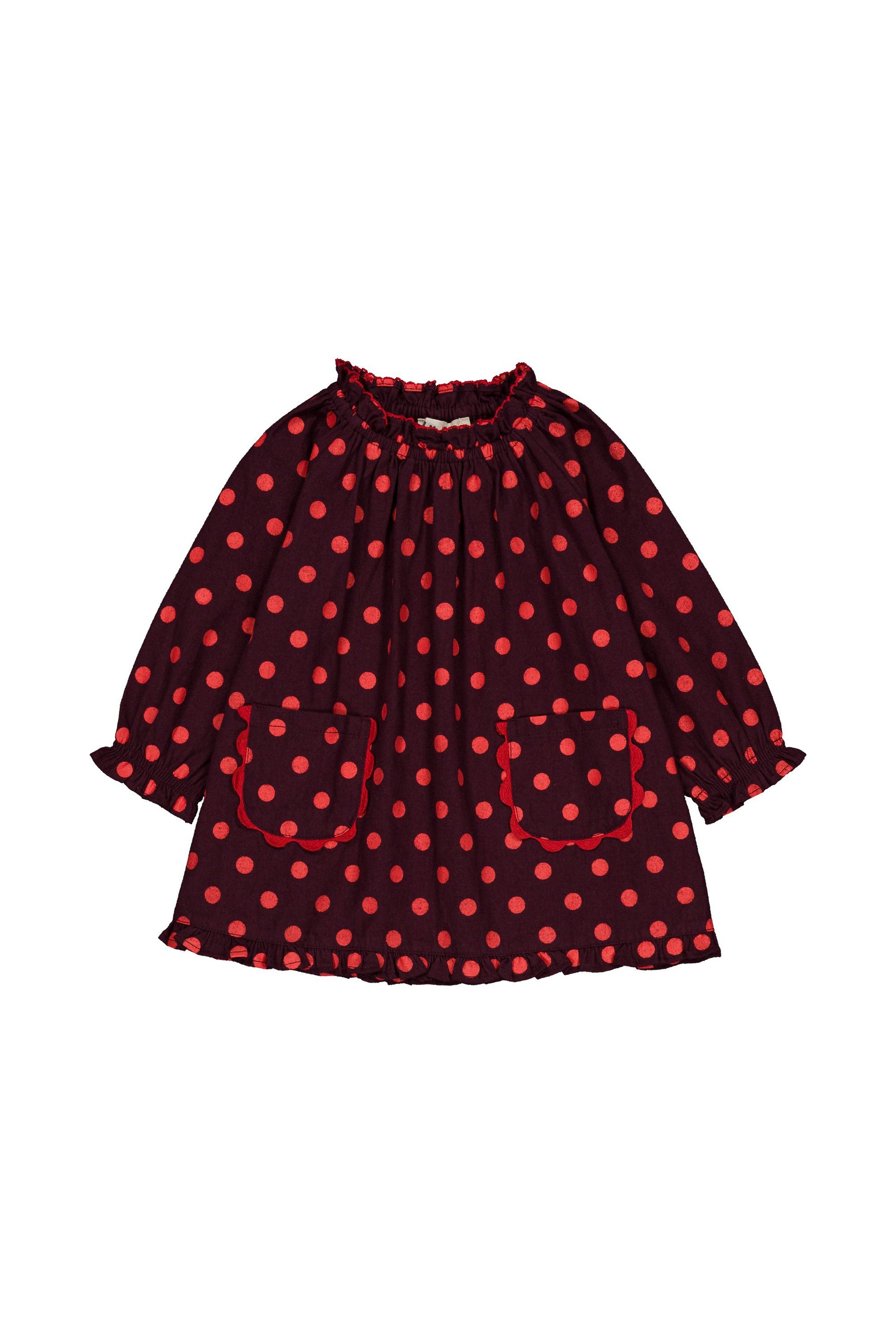 Baby dress in maroon with red dots and two front pockets, all on a white background